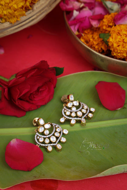 Surmai Studs Moissanite With Drops worn by a model showcasing scale and Earrings design.