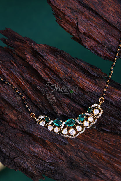 Green and moissanite Pendant with black beads