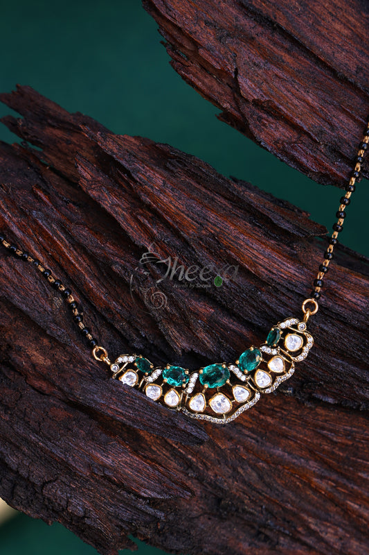 Green and moissanite Pendant with black beads