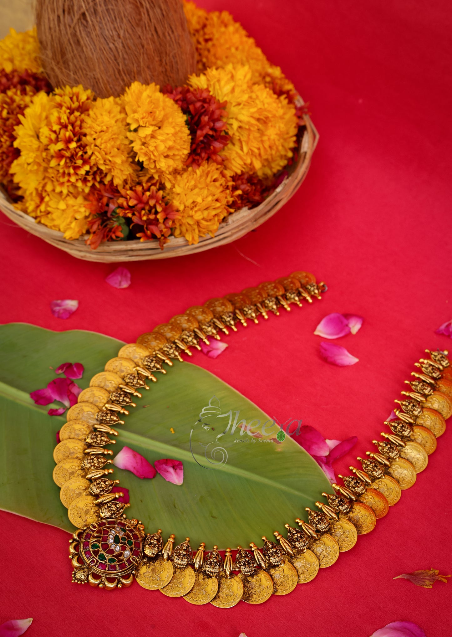 Close-up detailing of Temple Vilasam Long Kaasu Mala highlighting Antique Gold craftsmanship.