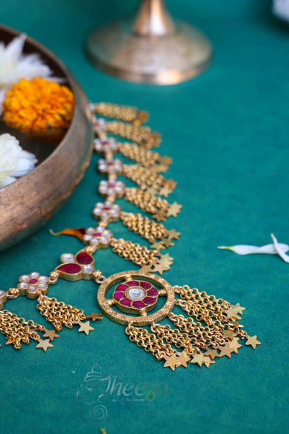 red and white kundan necklace set with bird earrings