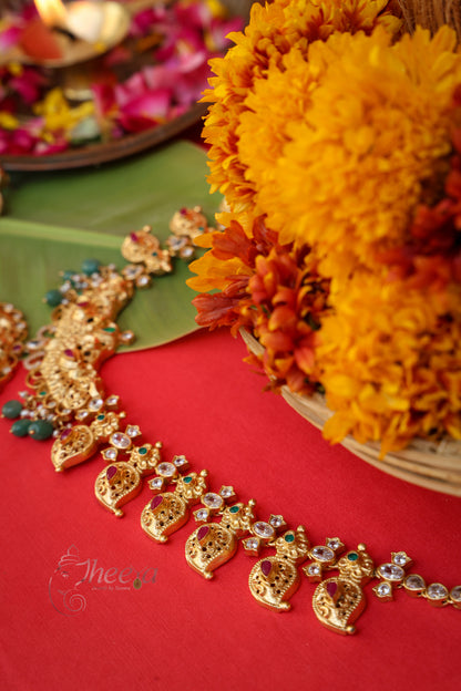 Close-up detailing of Kaveri Gold South Necklace highlighting Antique Gold craftsmanship.