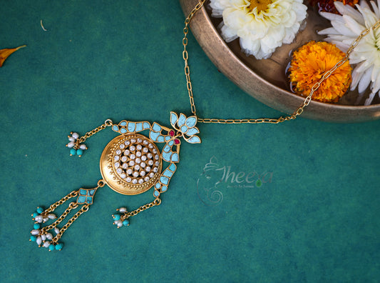 Turquoise gold tone pendant