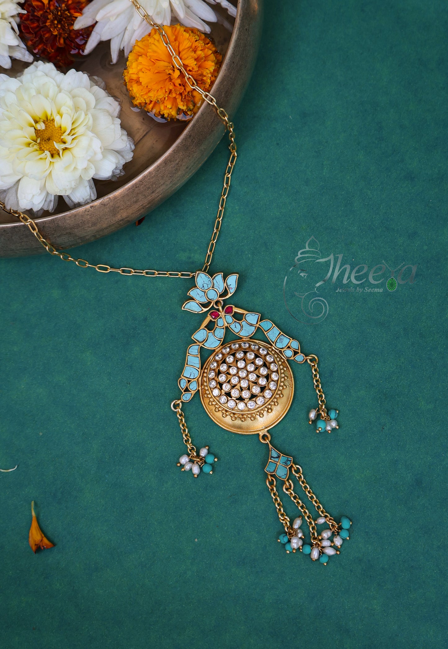 Turquoise gold tone pendant