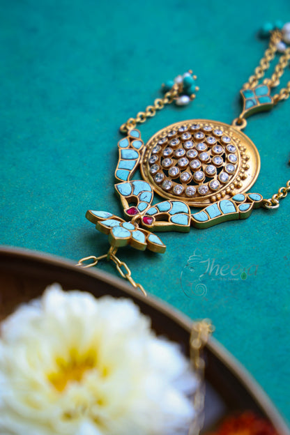 Turquoise gold tone pendant