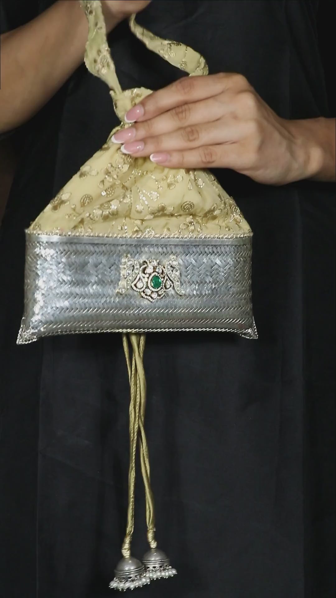 Premium silver potli evening bag studded with radiant golden moissanite