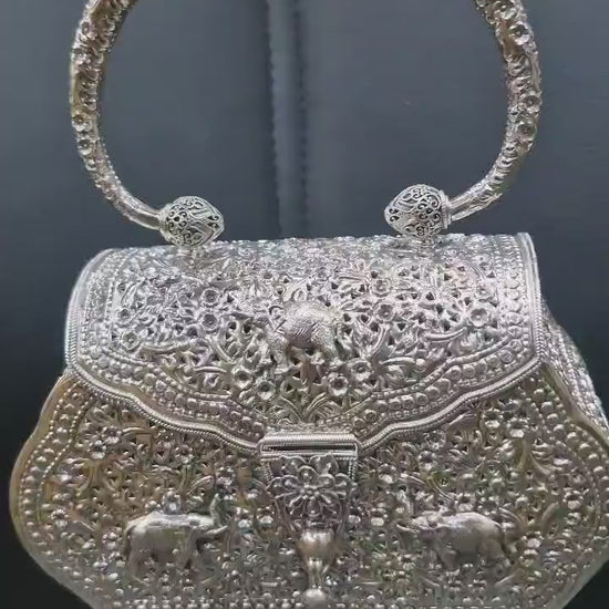 Sleek solid pure silver plain handbag designed for elegant evening wear