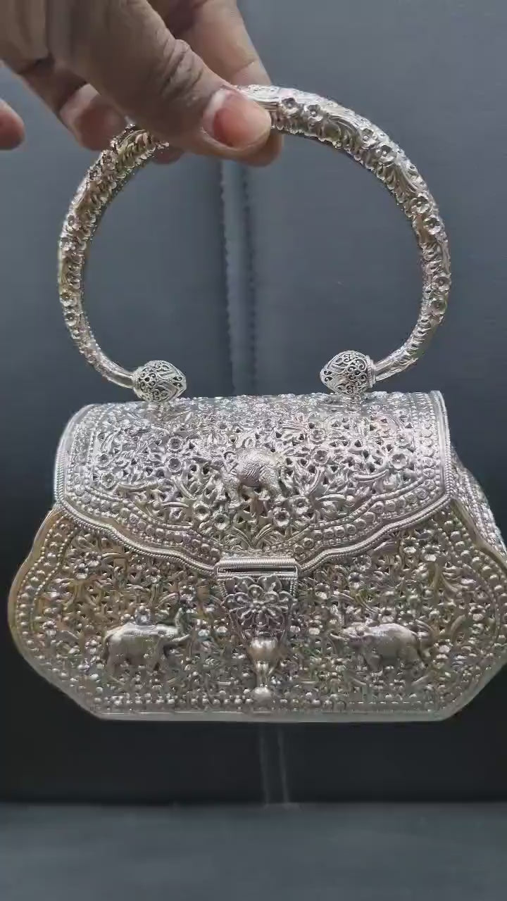 Sleek solid pure silver plain handbag designed for elegant evening wear