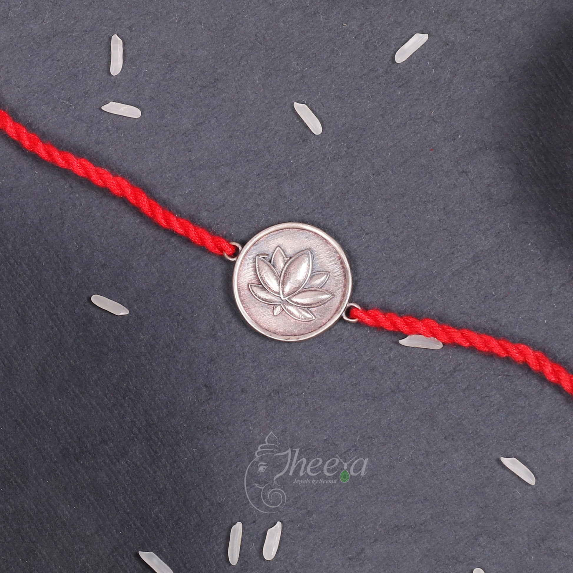 Close up detailed view of the Pure Silver In Hindi Rakhi
