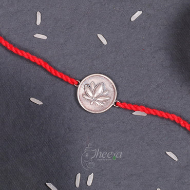 Close up detailed view of the Pure Silver In Hindi Rakhi