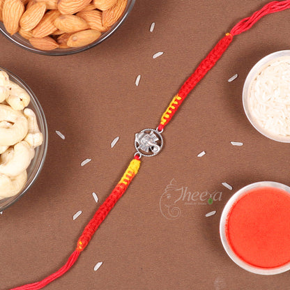 Close up detailed view of the Pure Silver Trishul Rakhi